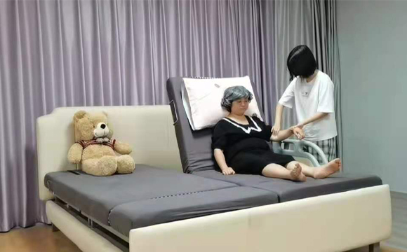 双旋转电动护理床